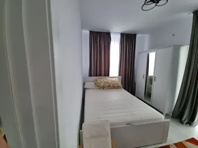 Dormitor apartament de inchiriere Sector 2 Bucuresti cu pat